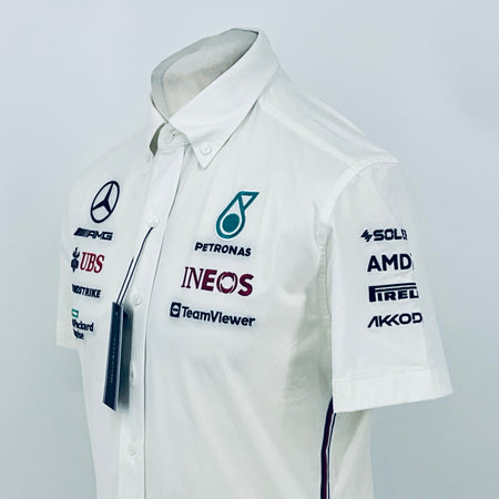 White team shirt front close-up with Petronas, INEOS, TeamViewer and sleeve sponsor logos