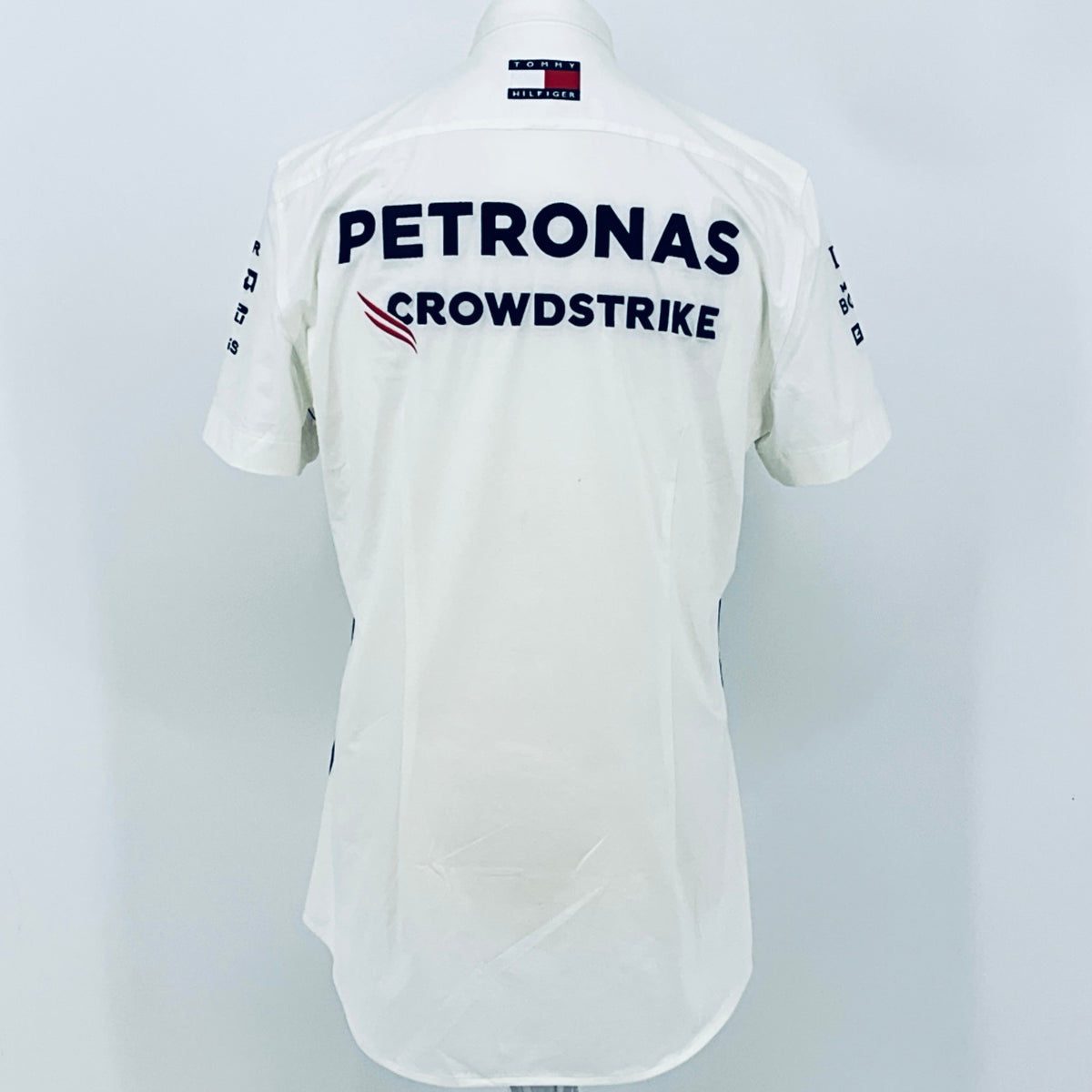 White back of team shirt with PETRONAS and CROWDSTRIKE logo across the upper back