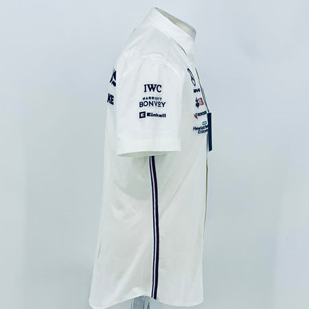 White team shirt side view with IWC Marriott Bonvoy logo and navy vertical stripe