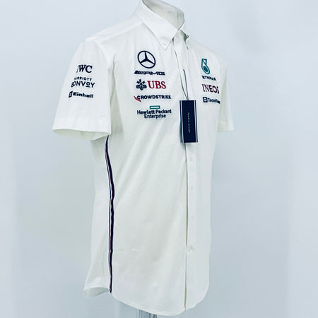 White team shirt with short sleeves and sponsor logos, button-front and collar