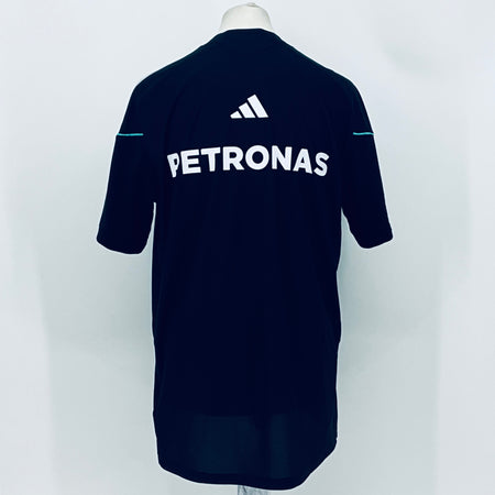 Navy F1 team t-shirt back with large PETRONAS text and adidas logo above.