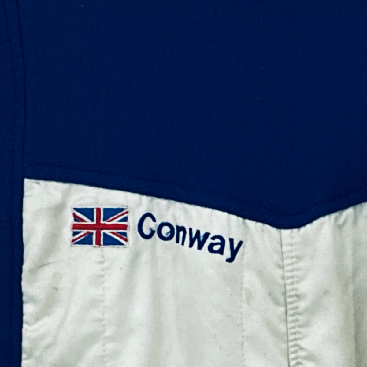 Race driver suit lower chest area with Union Jack and "Conway" text on white