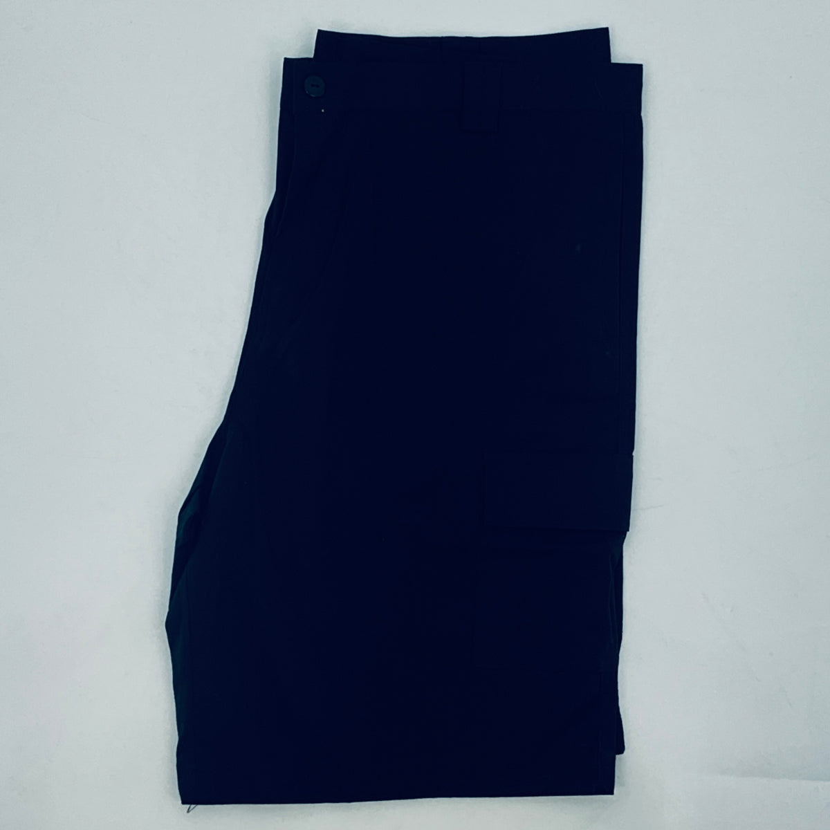 Navy shorts, folded flat with straight leg openings