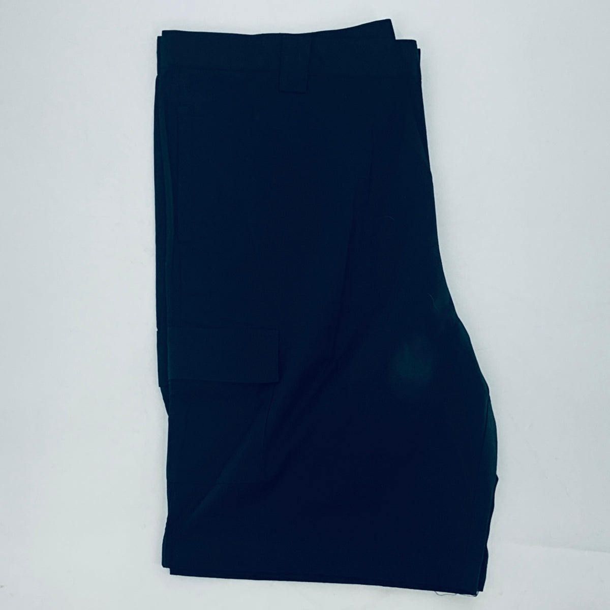 Navy shorts laid flat from the side