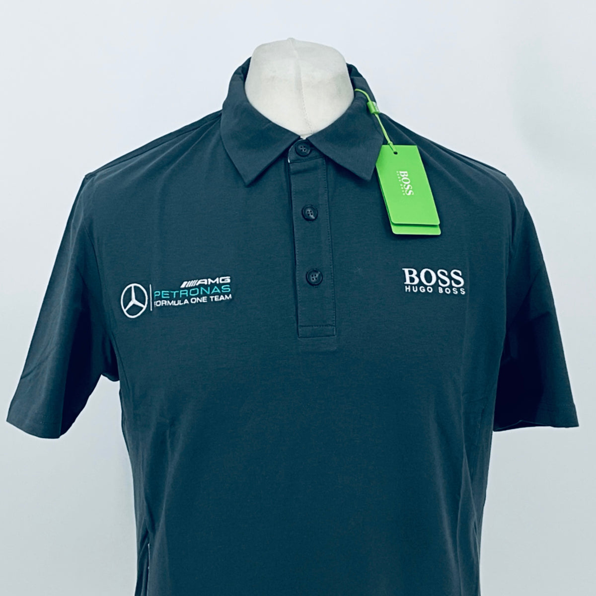 Boss polo shirt in dark teal, collared front with button placket and chest logos