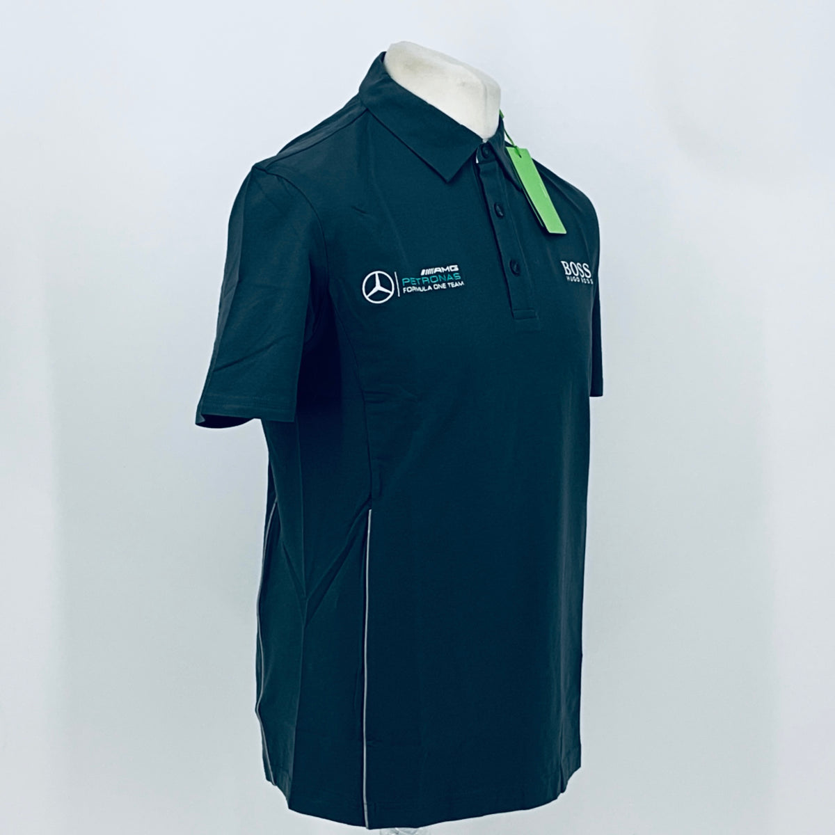Boss polo shirt in dark teal, front angled view with button placket and chest logos