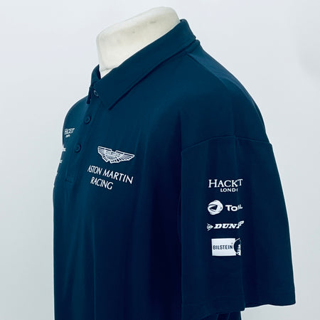 Teal Aston Martin Racing polo shirt with side sleeve sponsor badge and embroidered logos.