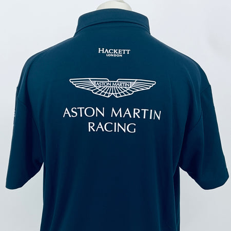 Teal Aston Martin Racing polo shirt, back view with winged Aston Martin emblem and HACKETT.
