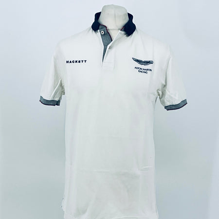 White polo shirt with navy collar, trim, and racing logo on chest