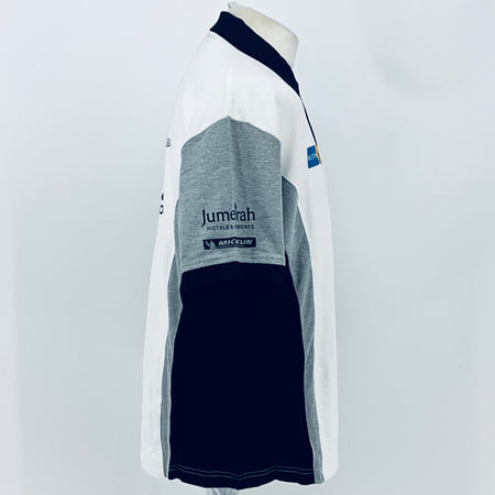 White and gray racing team polo shirt with navy collar and sleeve panels
