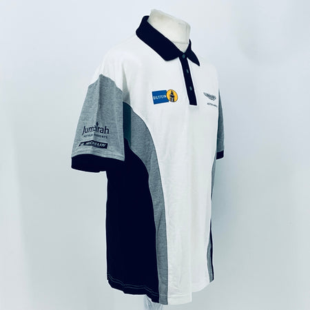 White racing polo shirt with navy collar tie, gray side panel, and chest logos