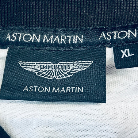 Navy fabric neck label with Aston Martin wing logo and size XL