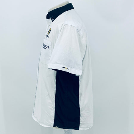 White short-sleeve button shirt with dark under-sleeve panel and small chest logo