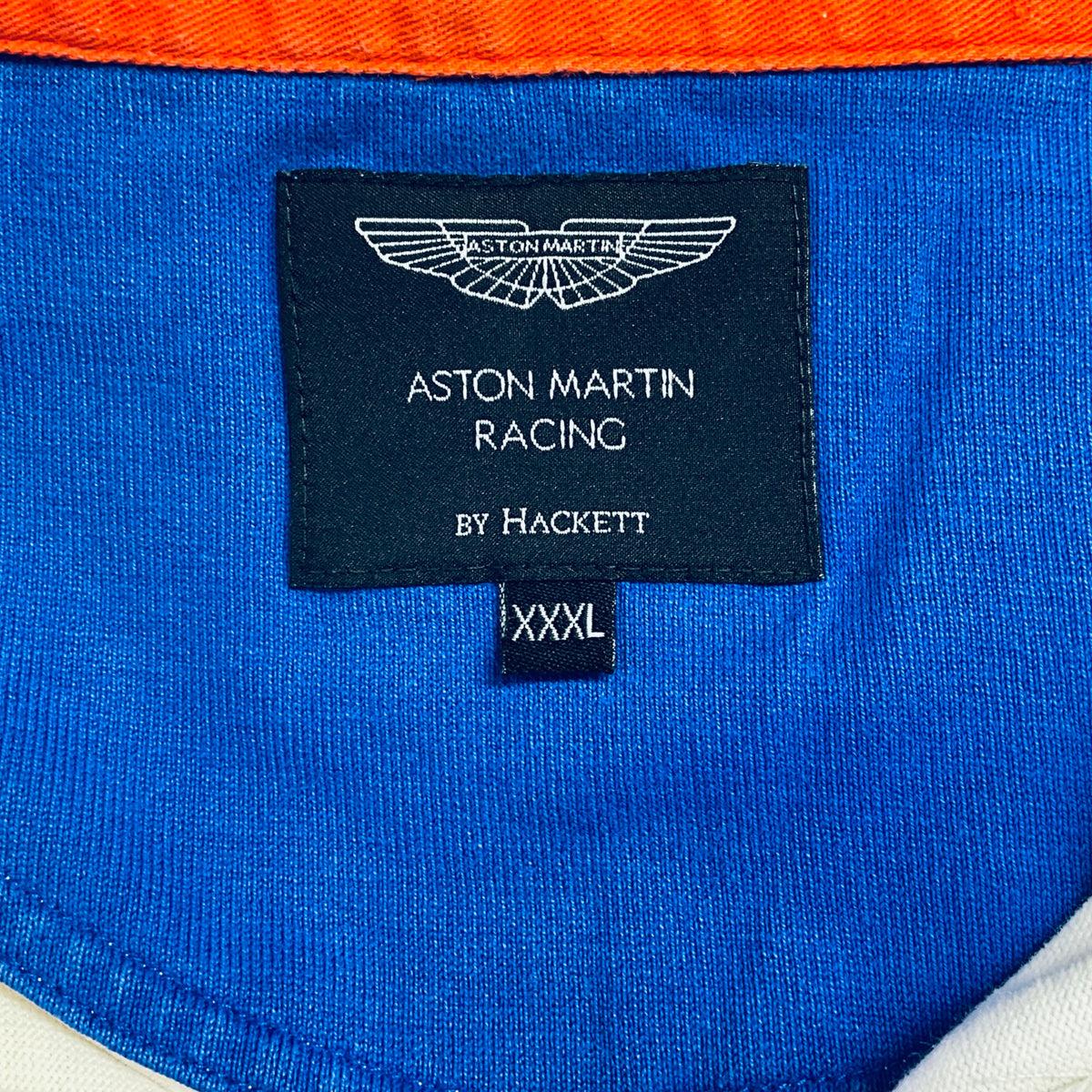 Black neck label with Aston Martin Racing by Hackett and size XXXL