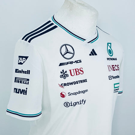 White team driver t-shirt, close-up front with Mercedes AMG, UBS, and sponsor prints