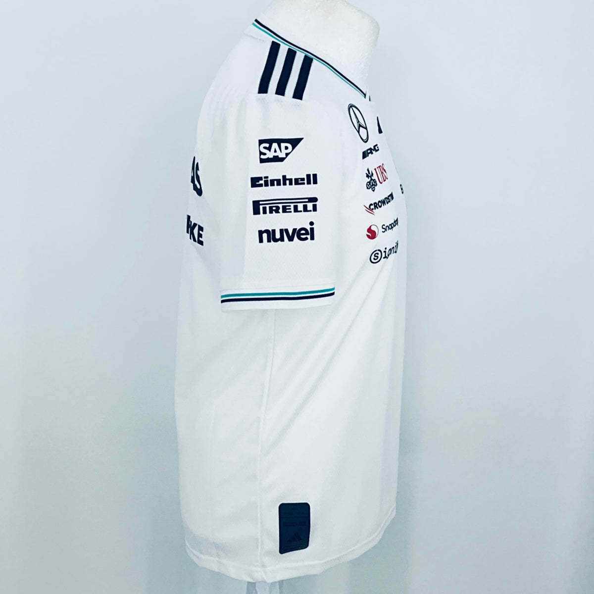 White team driver t-shirt, side view with SAP, Finchelli, IRELLI, and nuvei logos