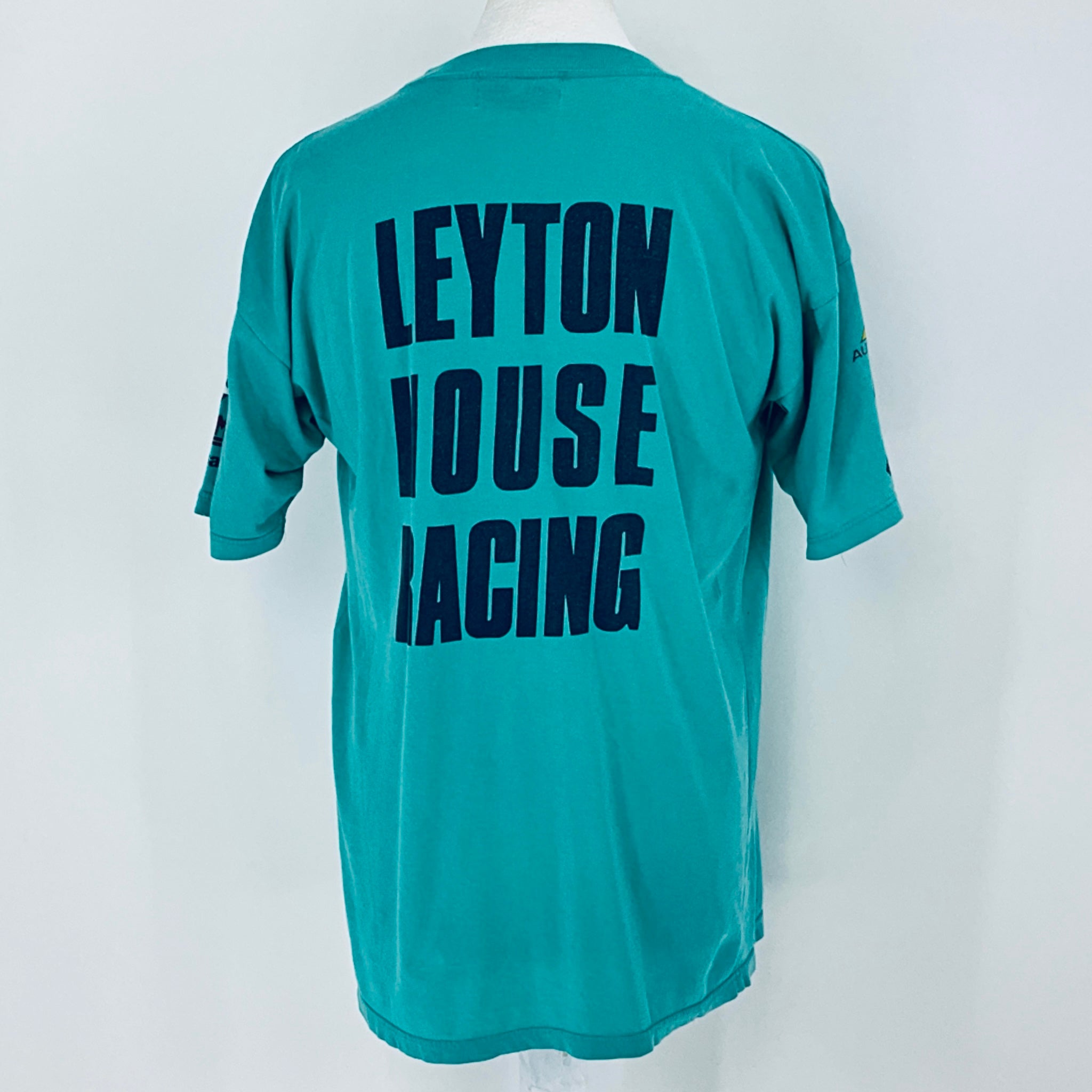 Teal t-shirt with 'LEYTON HOUSE RACING' text on the back against a white background