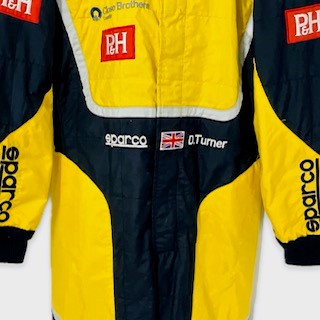 Darren Turner Race Used Aston Martin Racing 10th Anniversary Race Suit 2014